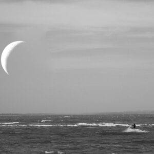 kitesurfer and moon