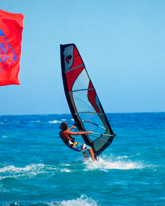 windsurfing Hurghada Red Sea strong wind action colorful sail Egypt